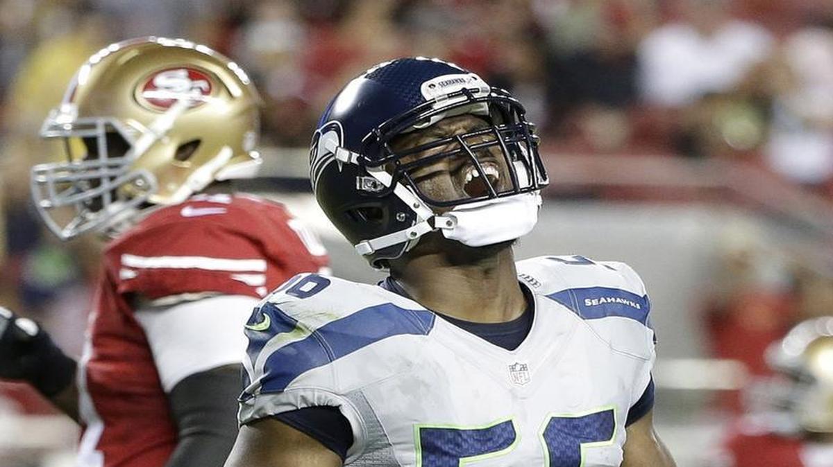 Seattle Seahawks defensive end Cliff Avril (56) reacts after sacking San Francisco 49ers quarterback Colin Kaepernick during the first half of an NFL football game in Santa Clara, Calif., Thursday, Oct. 22.