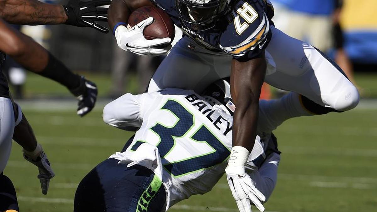 
Seahawks strong safety Dion Bailey, bringing down San Diego’s Melvin Gordon (28) during an September exhibition game, is starting in place of Pro Bowler Kam Chancellor, who remains a holdout.
