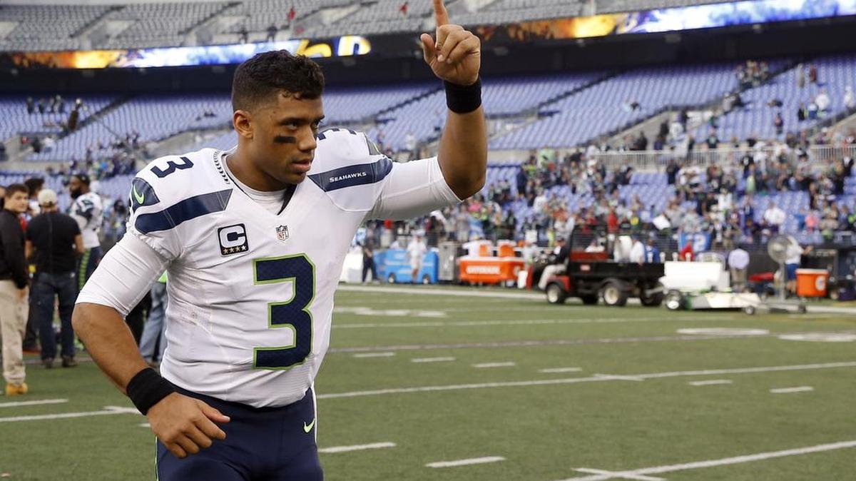 Seattle Seahawks quarterback Russell Wilson (3) reacts as he jogs off the field after an NFL football game against the Baltimore Ravens, Sunday, Dec. 13, 2015, in Baltimore. The Seahawks won 35-6.
