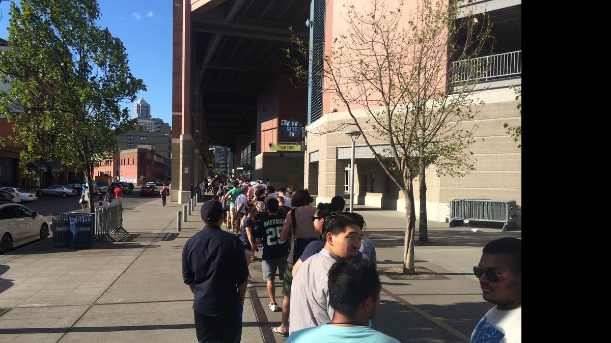 
The line at 6 p.m. Sunday, stretching from the northeast ticket windows around the north end of CenturyLink Field and down the west side past the team shop.
