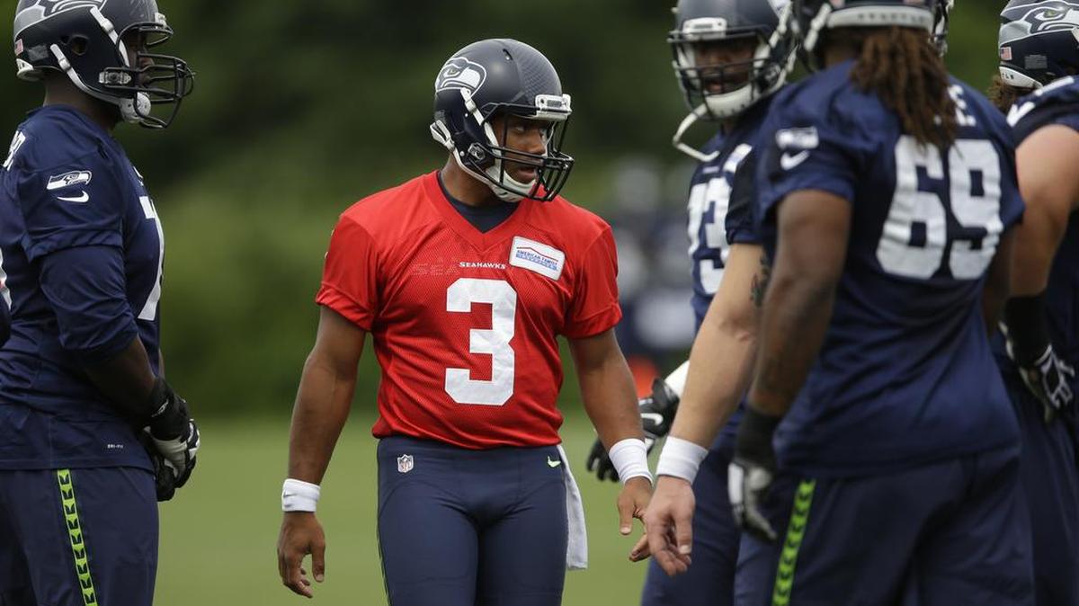 Seattle Seahawks quarterback Russell Wilson (3) takes part in NFL football practice, Thursday, June 9, 2016, in Renton.