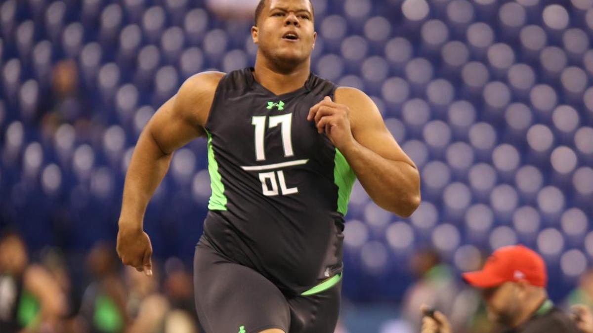 Stanford offensive lineman and Puyallup High school grad Joshua Garnett runs a drill at the NFL football scouting combine in February in Indianapolis.