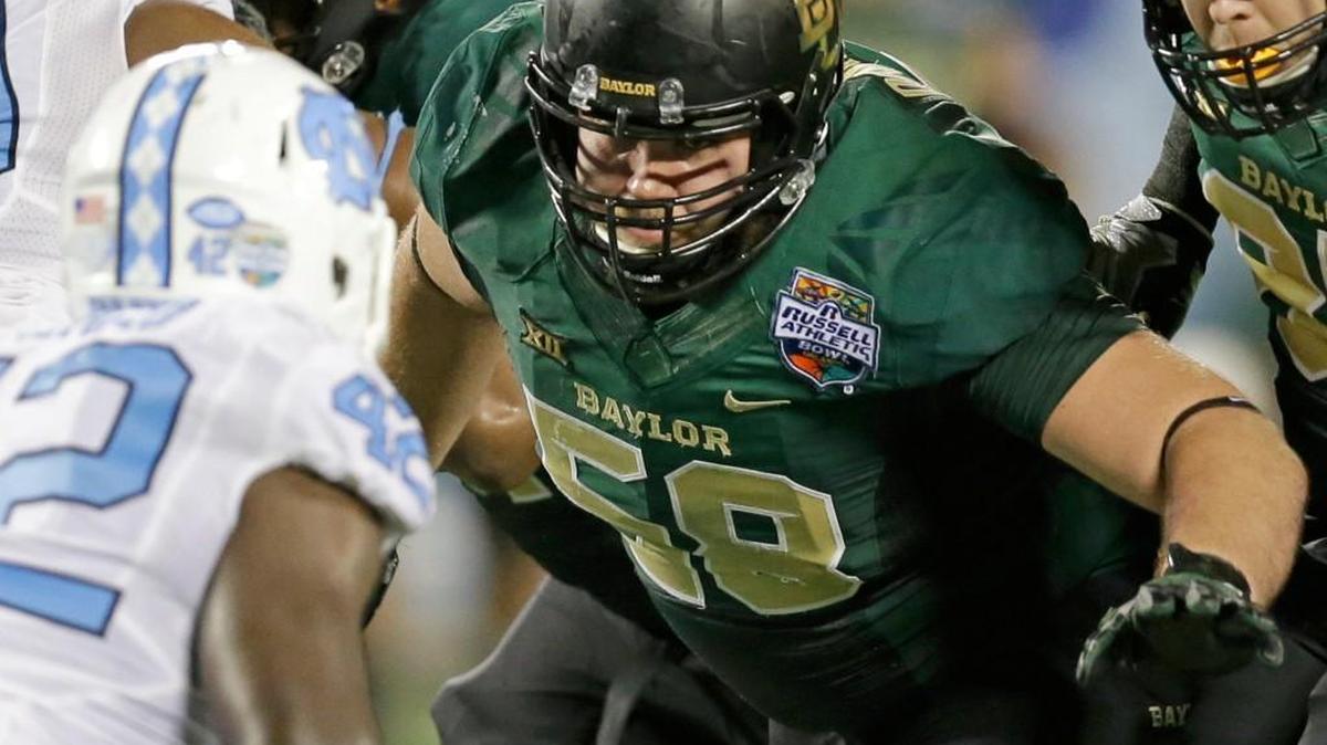 Baylor offensive tackle Spencer Drango, right, worked hard to get to this point and not just on the football field. Drango overcame dyslexia to become one of college football’s top scholar-athletes.