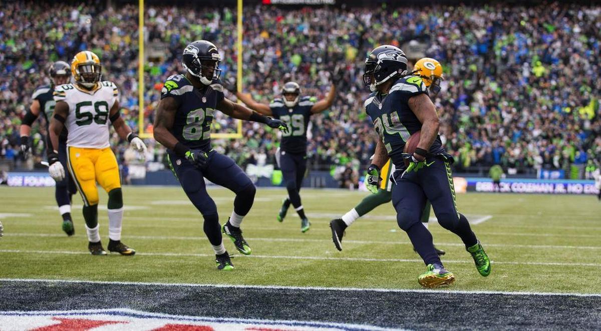 Seahawks running back Marshawn Lynch scores a 24-yard touchdown against the Green Bay Packers during the fourth quarter on Jan. 18.