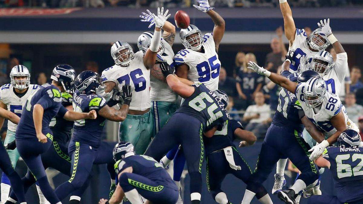 Dallas Cowboys' defensive tackle David Irving (95) gets up to block a field goal by Seattle Seahawks kicker Steven Hauschka (4) during the second half on Sunday, Nov. 1, 2015, at AT&T Stadium in Arlington, Texas.