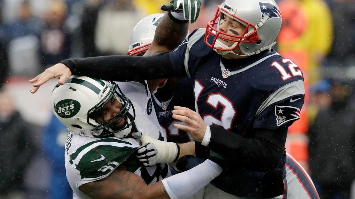 New York Jets defensive end Sheldon Richardson hits New England Patriots quarterback Tom Brady (12) in a Dec. 24, 2016, game in Foxborough, Mass. The Seattle Seahawks have acquired Richardson from the Jets in exchange for wide receiver Jermaine Kearse and a second-round draft pick.