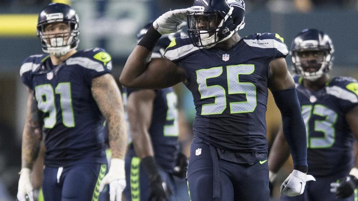 
Seattle Seahawks defensive end Frank Clark celebrates a tackle during an exhibition game against the Broncos on Friday, Aug. 14, at CenturyLink Field in Seattle.
