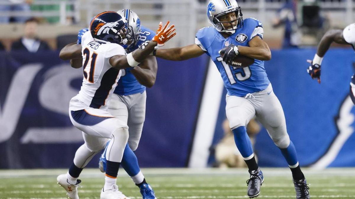 
Detroit Lions wide receiver Golden Tate (15) stiff arms Denver Broncos cornerback Aqib Talib (21) during an NFL football game at Ford Field in Detroit, Sunday, Sept. 27, 2015. Tate played for the Seahawks from 2010-13.
