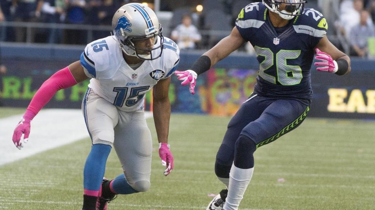 
New Seattle cornerback Cary Williams, defending against Detroit receiver Golden Tate, is starting to be more effective in the Seahawks' secondary. 
