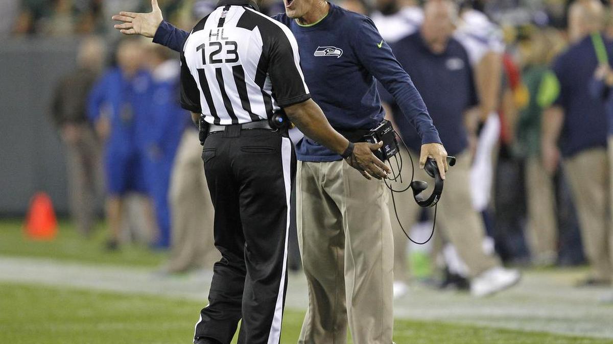 
Seattle Seahawks coach Pete Carroll argues a call Sunday during the team’s loss at Green Bay.
