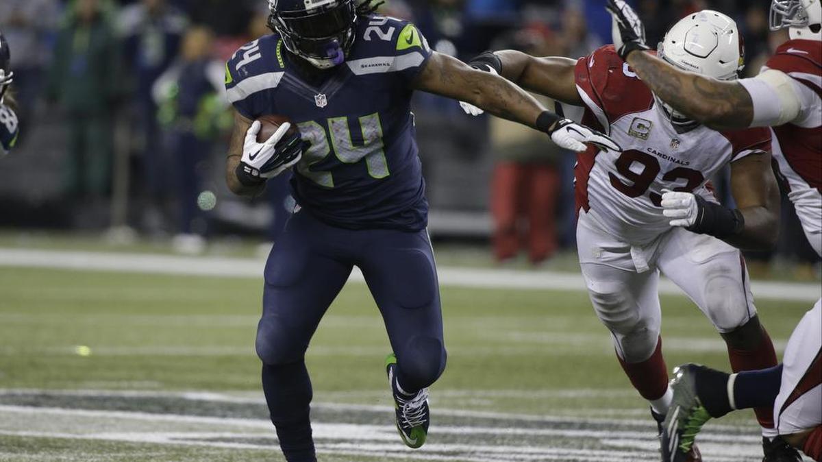 Seattle Seahawks running back Marshawn Lynch rushes against the Arizona Cardinals on Nov. 15, 2015, in Seattle.