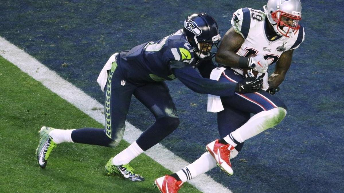 
Patriots wide receiver Brandon LaFell, right, runs into the end zone for a touchdown after a catch as Seahawks cornerback Tharold Simon defends during the first half of NFL Super Bowl 49 in February. 
