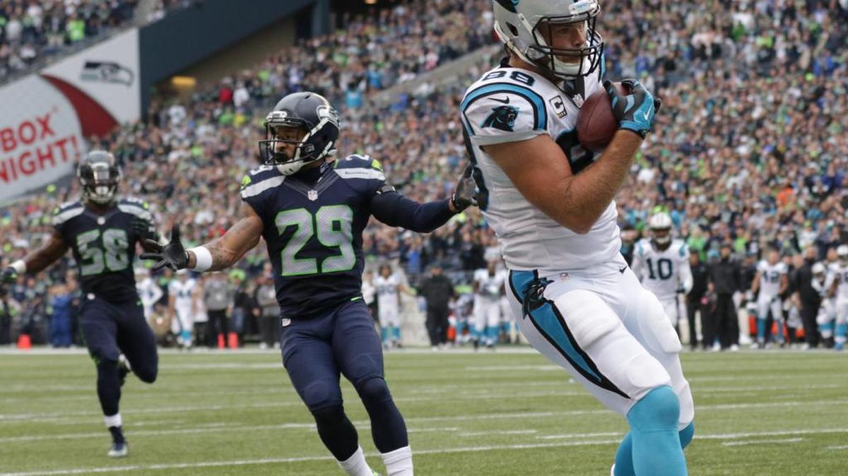 Seattle Seahawks Carolina Panthers tight end Greg Olsen, right, catches a pass for a touchdown ahead of Seattle Seahawks free safety Earl Thomas (29) in the second half of an NFL football game, Sunday, Oct. 18, 2015, in Seattle.