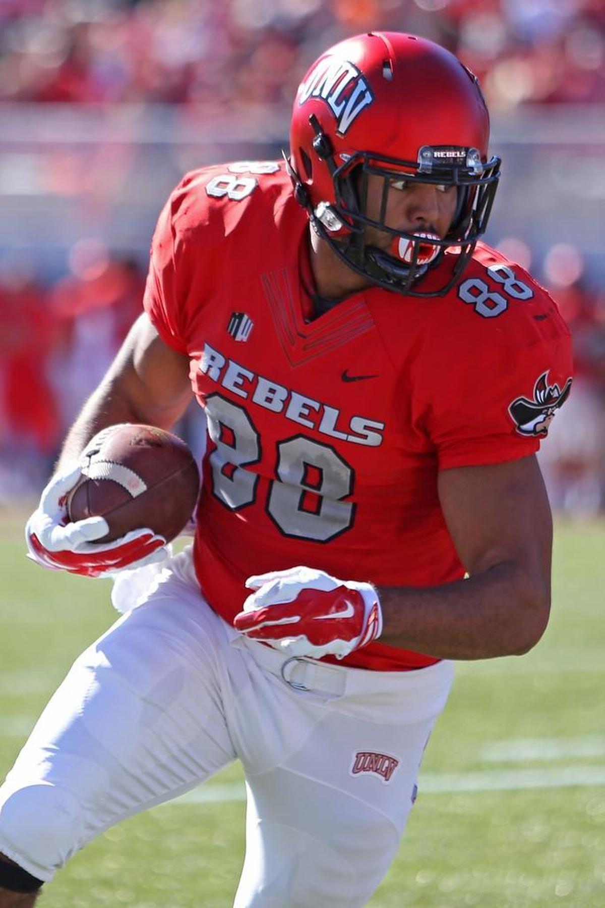 UNLV tight end Andrew Price looks for running room during the 2016 season. Price, a graduate of Blaine High School, hopes to be selected in the 2017 NFL Draft this weekend.