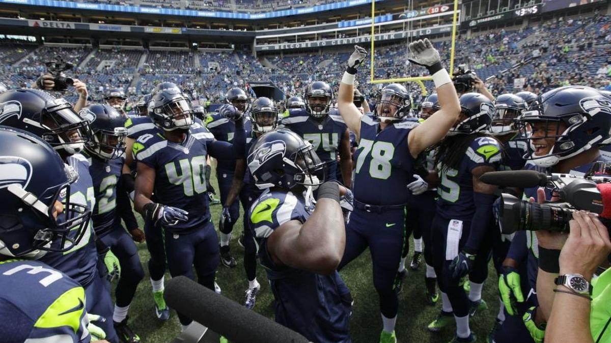 Seattle Seahawks offensive tackle Bradley Sowell (78) cheers during a huddle during warmups before an NFL football game against the Miami Dolphins, Sunday, Sept. 11, 2016, in Seattle.
