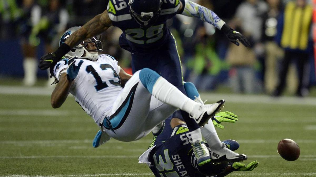 Seahawks free safety Earl Thomas (29) upends Panthers wide receiver Kelvin Benjamin (13) in December. Thomas had his season ended by a broken leg but is healthy again.