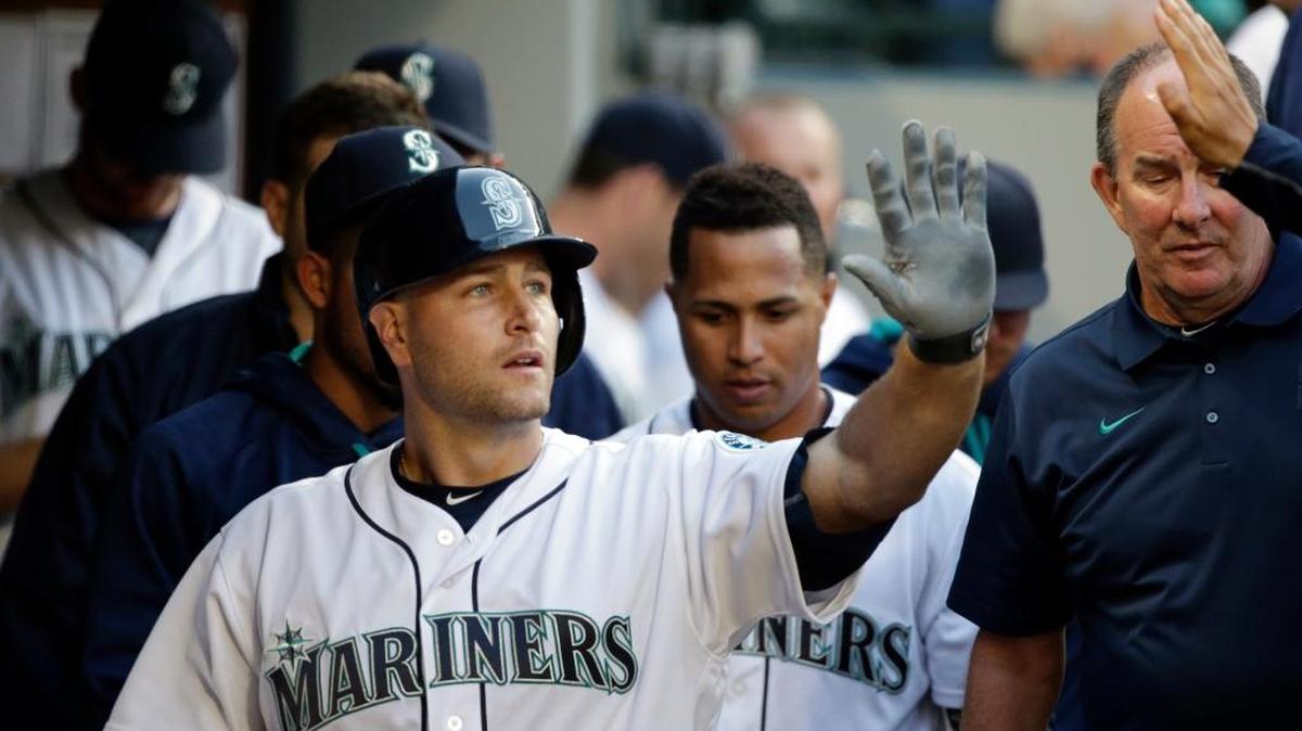 Seattle’s Chris Iannetta is congratulated following his home run against the Oakland Athletics April 9. Iannetta has gotten off to a better start this year than he did with the Angels in 2015.