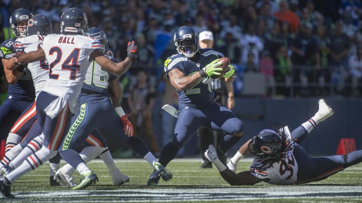 Seahawks running back Marshawn Lynch fights off Bears linebacker Pernell McPhee during Sunday's NFL football game against the Chicago Bears at CenturyLink Field in Seattle on Sunday, Sept. 27, 2015. 