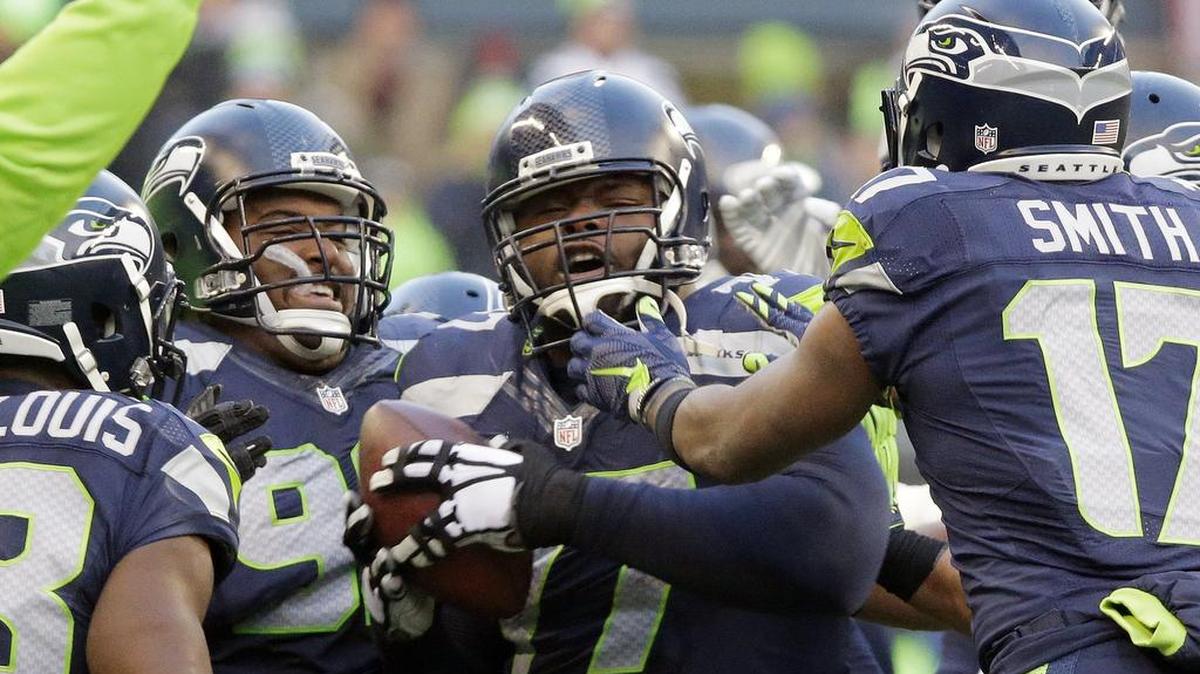 In 13 games Seahawks defensive tackle Ahtybe Rubin, center with ball, has 29 tackles, two sacks and one memorable interception, which Rubin celebrates with teammates on Nov. 29 against Pittsburgh.