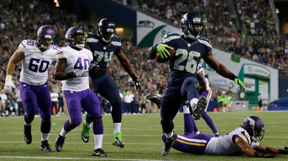 Seattle Seahawks’ running back Troymaine Pope (26) scores a touchdown against the Minnesota Vikings during the second half of a preseason NFL football game Thursday, Aug. 18, 2016, in Seattle.