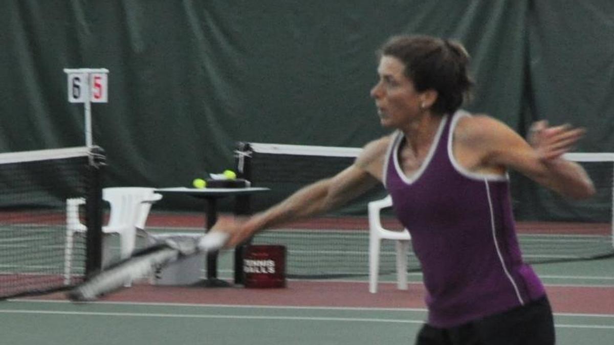 Ann Whitney returns a shot against Anissa Swift in the Women’s Open championship match of the 2011 Bellingham City Open. Whitney last week won a national title at the USTA National Indoor Championships in Cincinnati, Ohio.