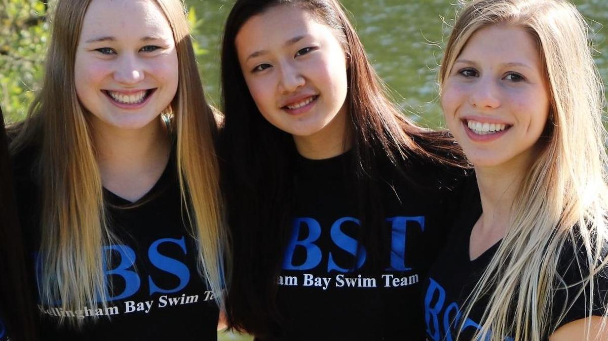 Bellingham Bay Swim Team’s Emma Carlton, left, Yanran Le and Emma Frey have been selected 2015-2016 Scholastic All-Americans.