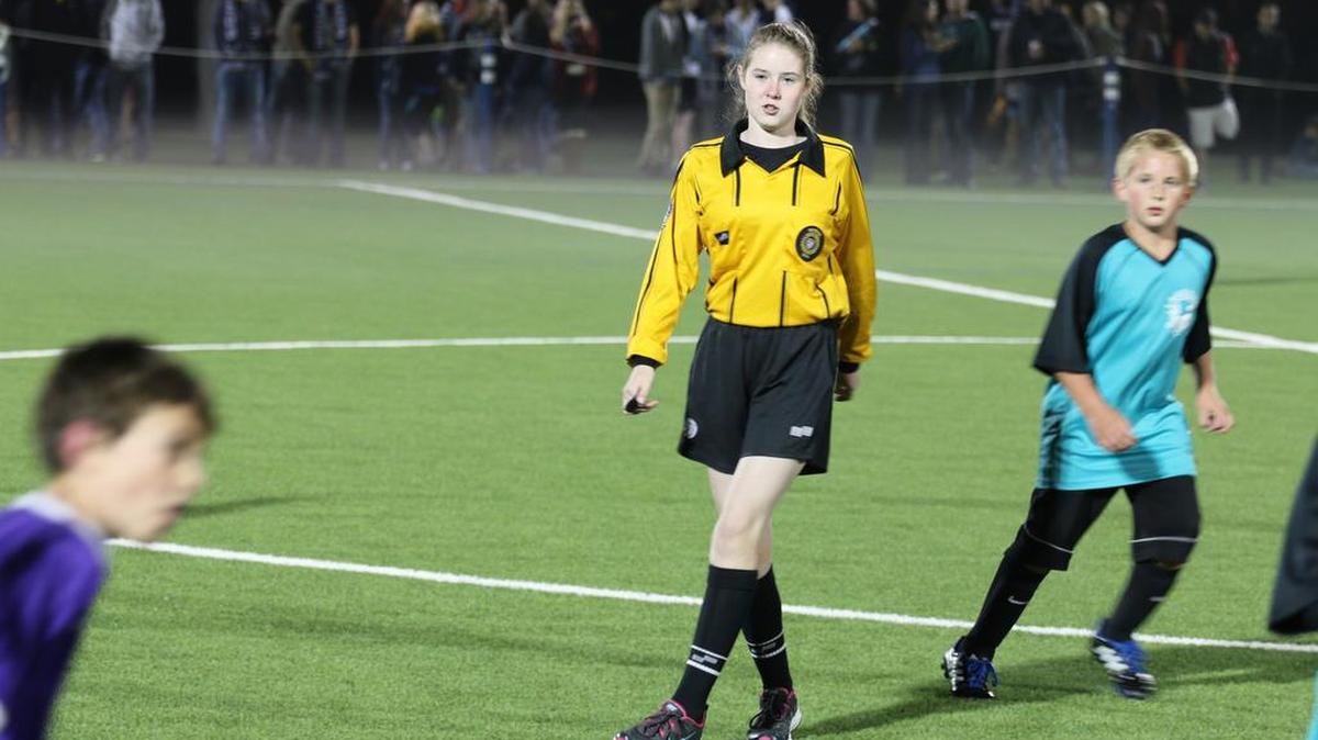 
Jozlin Peterson referees an exhibition match for Whatcom Youth Soccer on Sept. 2, 2014, at Western Washington University’s Robert S. Harrington Stadium. 

