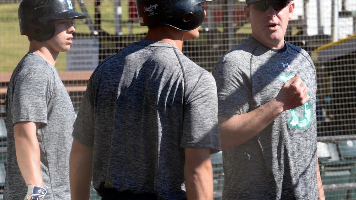 
Bellingham Bells coach Jeff James gives instruction to a player during Bells batting practice in preparation for a game against the Kelowna Falcons Friday, July 31, at Joe Martin Field 
