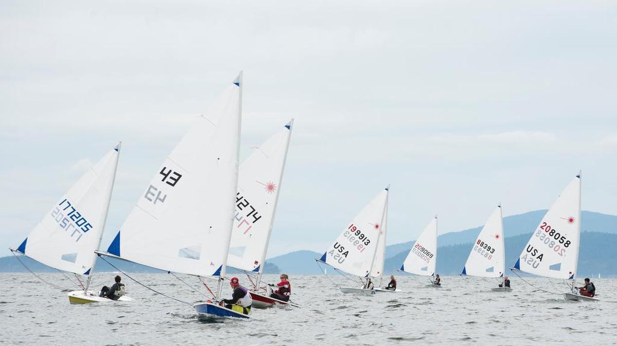 
A large group of Laser Radial sailboats races across Bellingham Bay at the 2015 Bellingham Youth Regatta on Saturday, Aug. 8, in Bellingham
