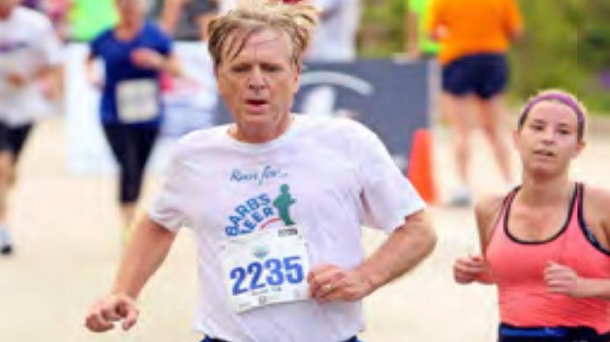 Tom Murphy runs a race in Mystic, Conn., in 2015 to promote the Barb’s Beer cause. He will be running the Boston Marathon on Monday, April 18.