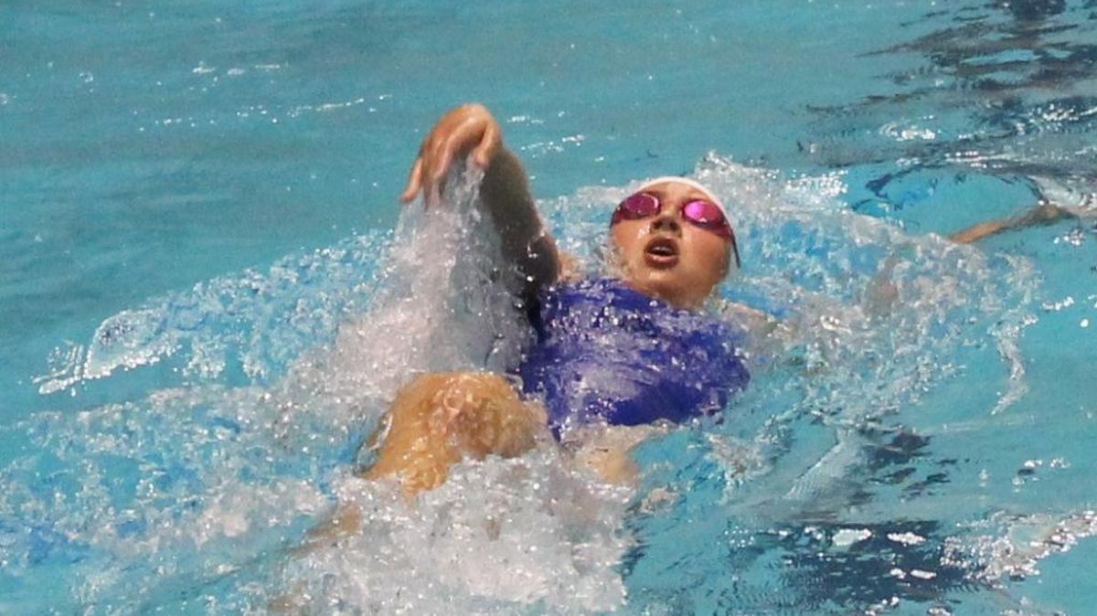 Emma Carlton swims at the Pacific Northwest Swimming Championships July 24 at the King County Aquatic Center in Federal Way. Carlton won the 100-meter butterfly at the West Coast Sectionals on Saturday, March 19, and qualified for the U.S. Olympic Swim Trials.
