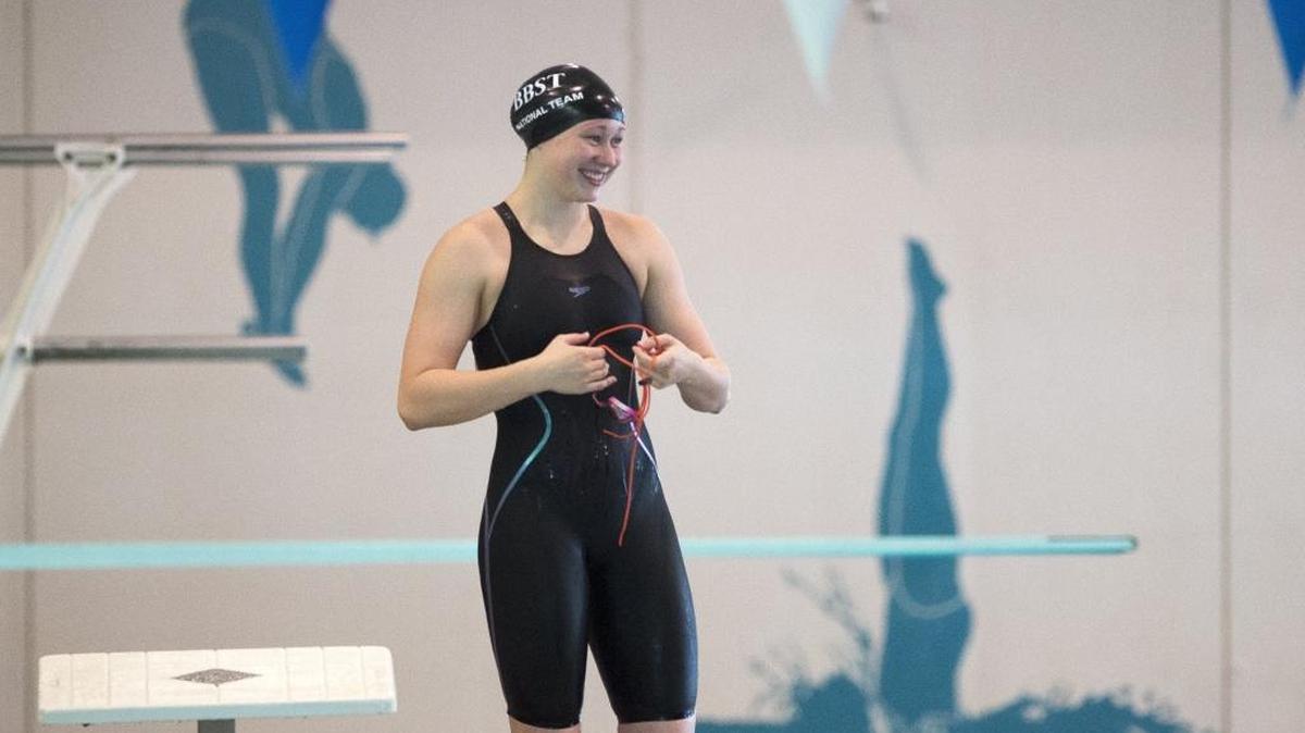 Bellingham Bay Swim Team member Emma Carlton readies to enter the pool during in June 2016 at Arne Hanna Aquatic Center.