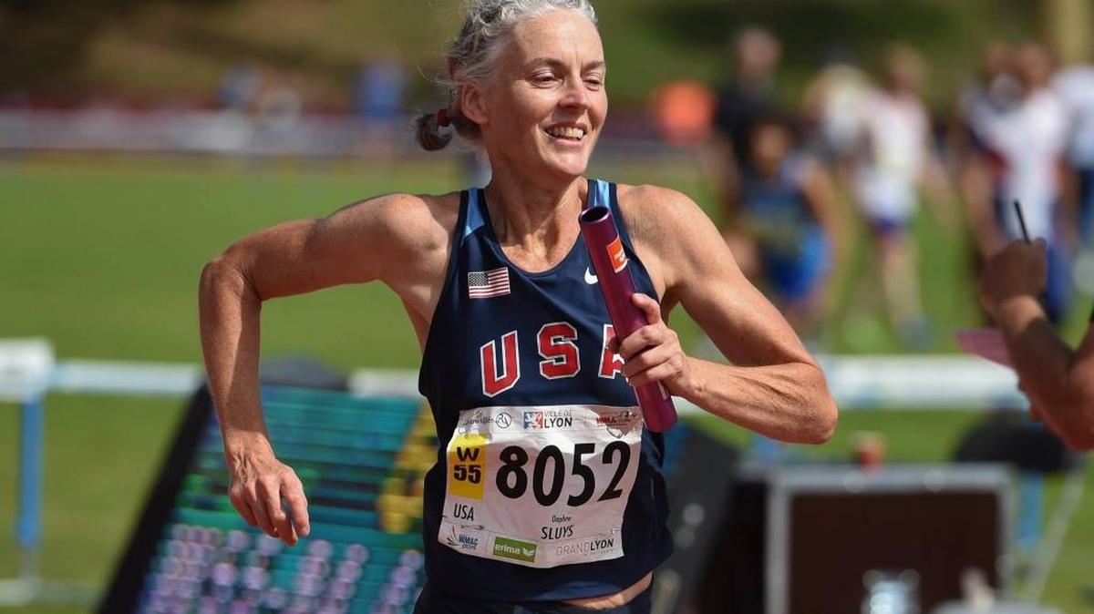 
Daphne Sluys at the end of the 4x100 Meter Relay W55 on Aug. 16, at the Masters World Outdoor Championships in Lyon, France.
