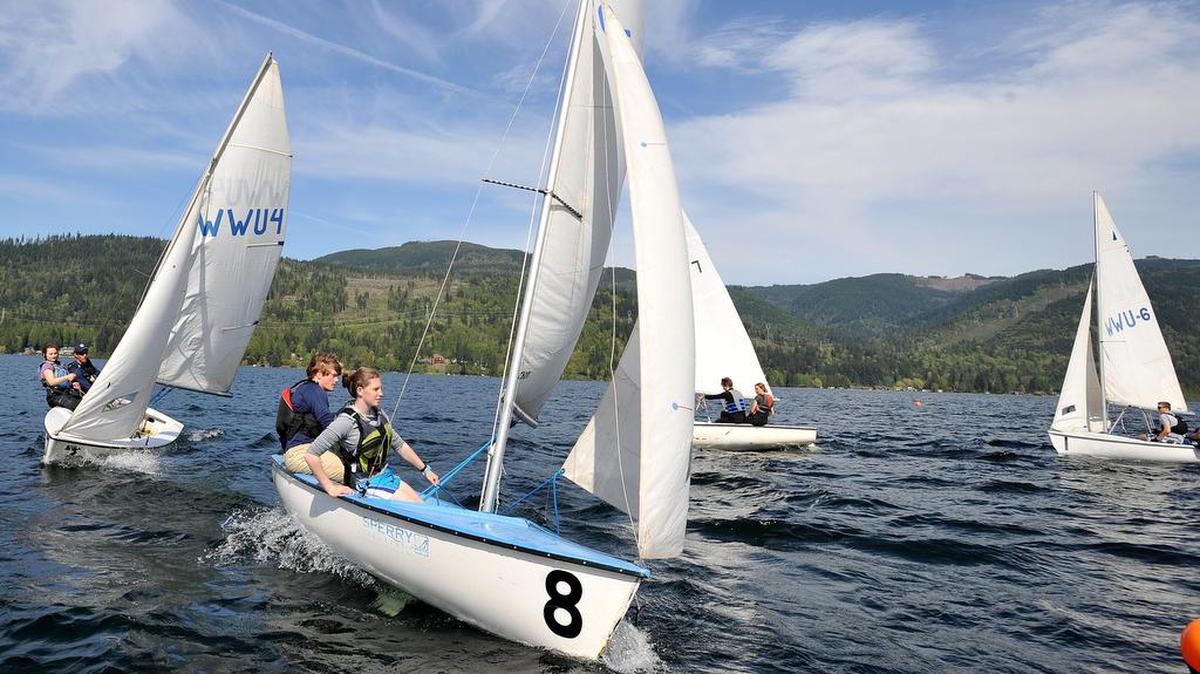 
Liam Hood and Shea Walker lead a group of boat around a marker bouy during a short race as the Sehome sailing team practices single boat and team sailing in Lake Whatcom on Thursday, May 1, 2014 in Bellingham.
