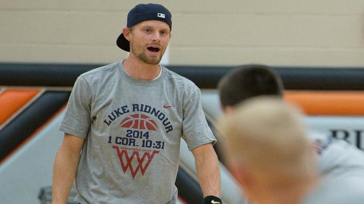 NBA point guard Luke Ridnour teaches dribbling drills to local kids at the Luke Ridnour Basketball Camp Wednesday, August 6, 2014 at Blaine High School. Ridnour’s 2015 camp begins Wednesday, July 29. 
