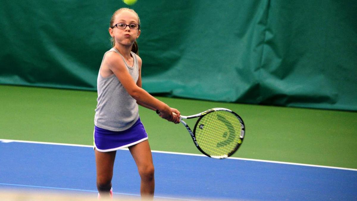 
Avery Brooks prepares to hit the ball back for a final point against her sister during practice Wednesday, August 5, at Bellingham Tennis Club.
