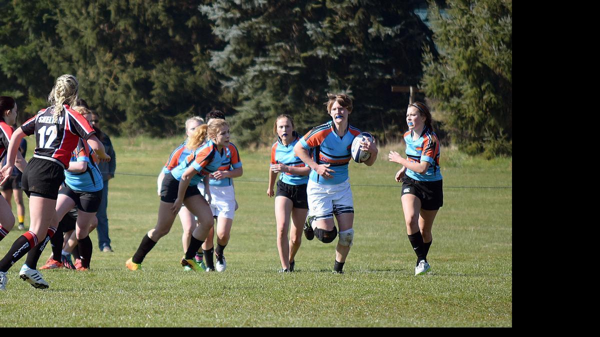 
Daja Curtis carries the ball during a March rugby match at the Bellingham Rugby and Polo Grounds in Ferndale.
