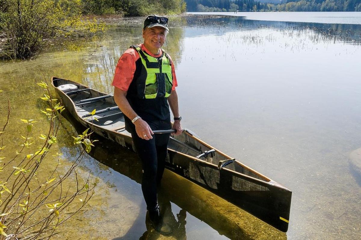 Ski to Sea competitor David Scherrer prepares to enter his canoe at Lake Padden April 25. Scherrer says he may have the longest streak competing in the annual Ski to Sea adventure race which is run each year the Sunday before Memorial Day.