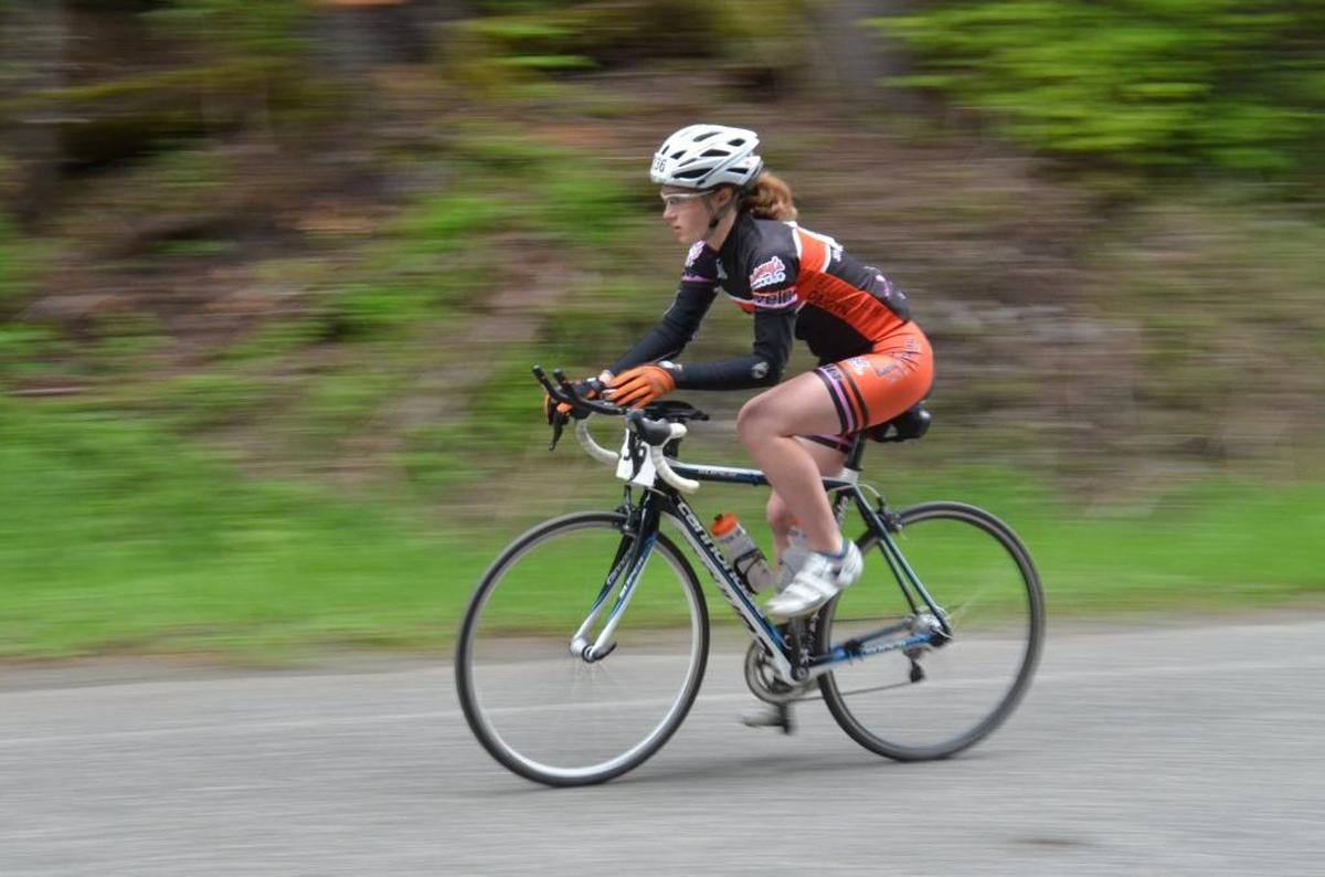 Shannon Mallory of team High Expectations speeds along the road bike leg of the 2014 Ski to Sea race near Glacier.