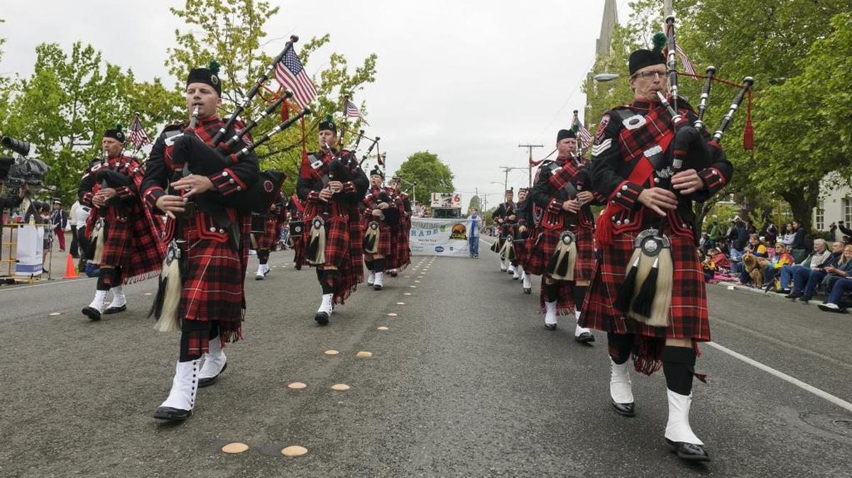 The Bellingham Firefighters Pipes & Drums perform for the crowd during the 2015 Blossomtime Parade on Cornwall Avenue in Bellingham. A Marine Corps league based in Bellingham stepped up and raised enough money to hold the parade in 2018 what will now be known as the Whatcom County Memorial Day Parade.