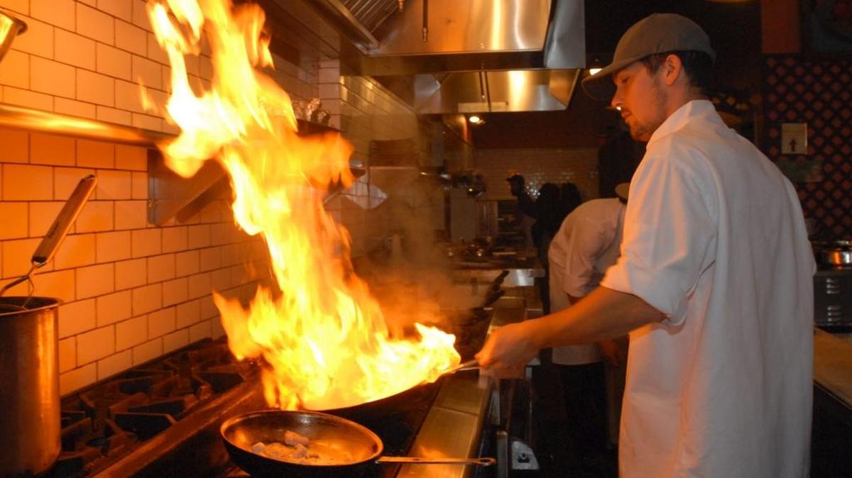 Chef Willy Barling makes a saute at D'Anna's Cafe Italiano in October 2008. Competing in a leg of the Ski to Sea race can work up a hearty appetite.