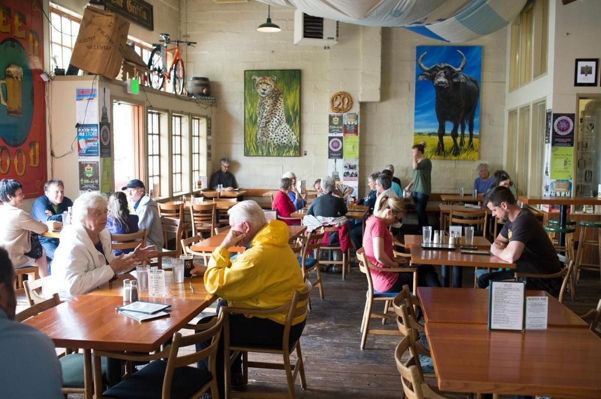 People dine and drink beer at Boundary Bay Brewery on Tuesday, May 10, in Bellingham.