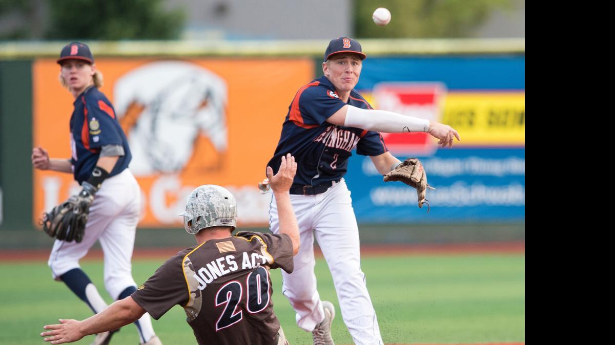 
Bellingham’s Post 7 American Legion's Jordan Wittenberg turns a double play with the help of teammate Ernie Yake during an exhibition game against the United States Military All Star Baseball Team on Wednesday, June 24, at Joe Martin Field, in Bellingham.
