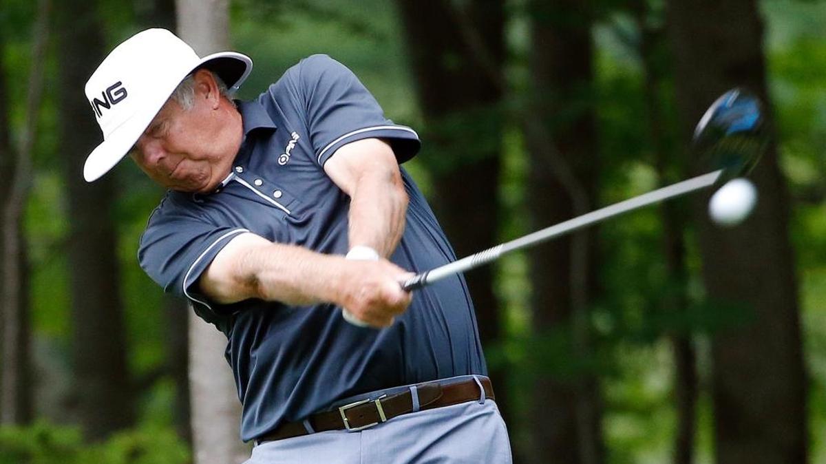 Kirk Triplett tees off on the ninth hole during the first round of the U.S. Senior Open golf tournament, Thursday in Peabody, Mass. Triplett was the first-round leader at 8-under.