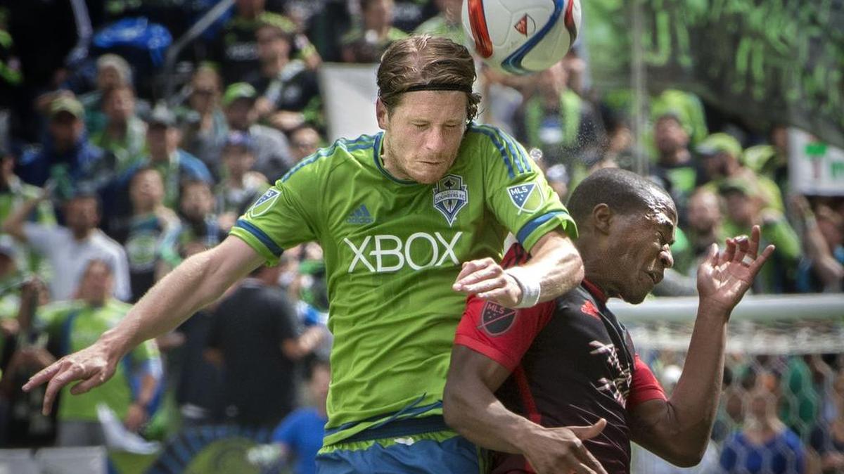 Sounder’s Erik Friberg heads the ball above a Timbers player at CenturyLink Field last year.