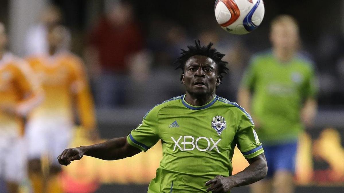 Seattle Sounders' Obafemi Martins watches the ball in the second half of an MLS soccer match against the Houston Dynamo, Saturday, April 4, 2015, in Seattle.