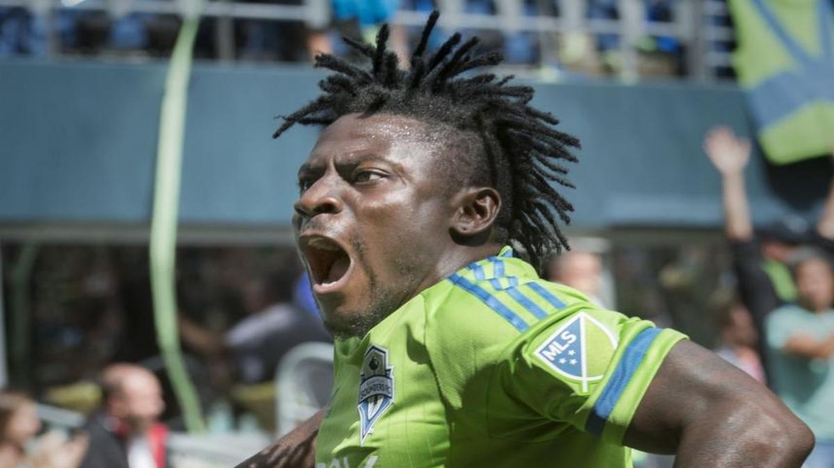 
Sounders forward Obafemi Martins celebrates his goal Sunday in his team’s 2-1 victory against Portland at CenturyLink Field.
