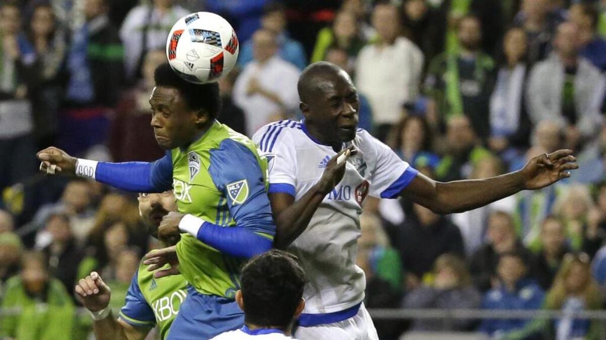 Seattle Sounders forward Oalex Anderson, left, said he wanted to cap off a dramatic run against the Montreal Impact on Saturday with a pass to a teammate. But that pass never came.